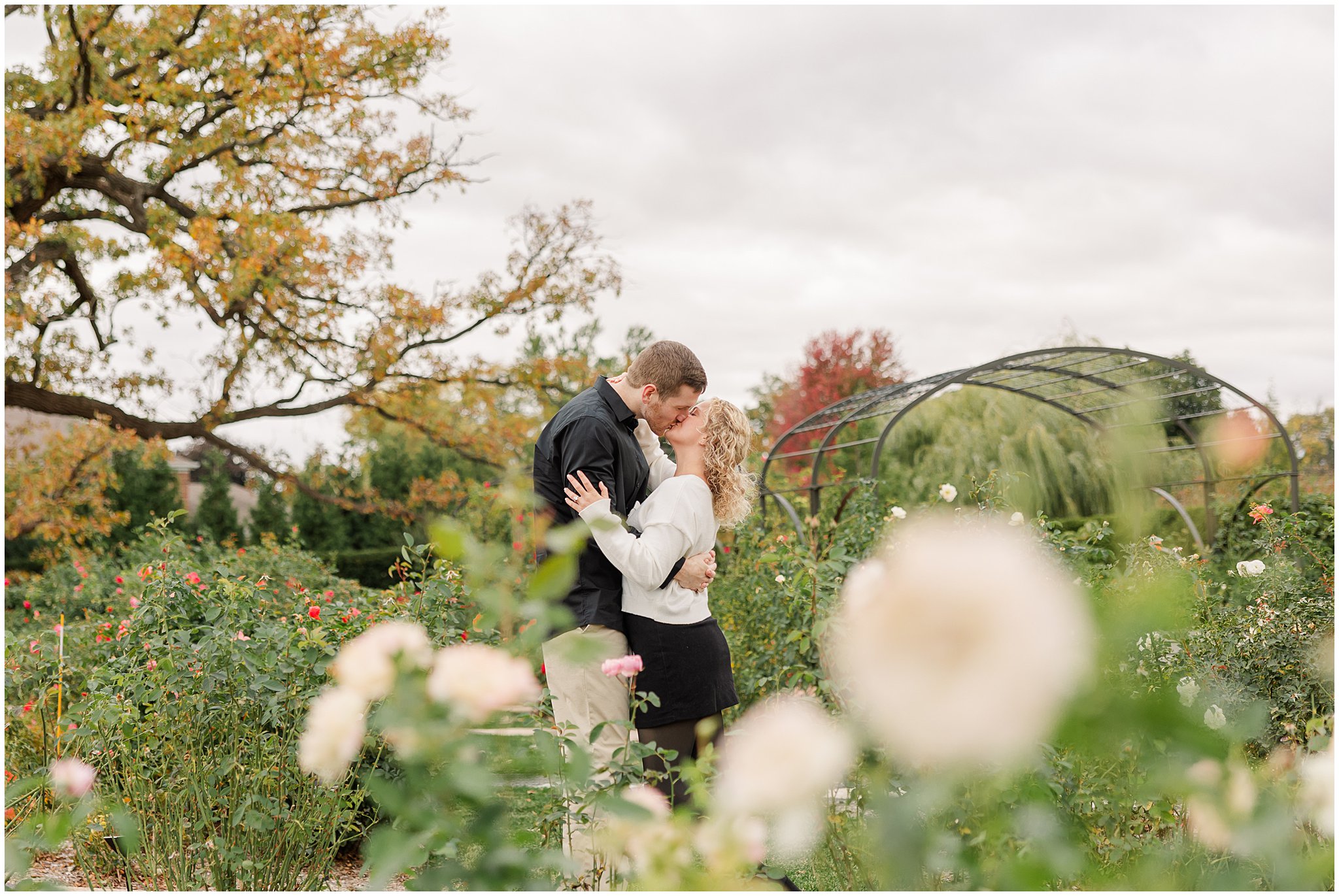 Sweet moment from Katie & Johnny's engagement session at Cantigny Park captured by Rachael Watson Photography.